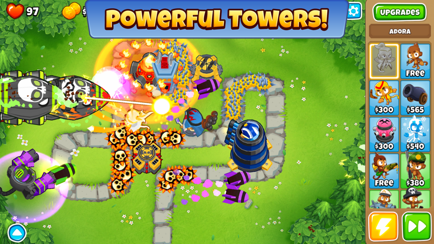 Bloons TD 6 screenshot — monkey towers popping waves of balloons along a winding path