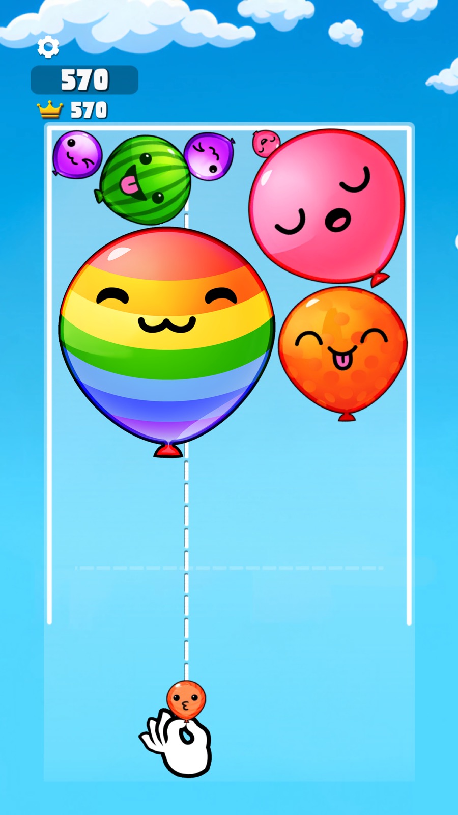 Fruit Merge: Melon Game gameplay screenshot — dropping cute round fruit with faces to merge up to a melon