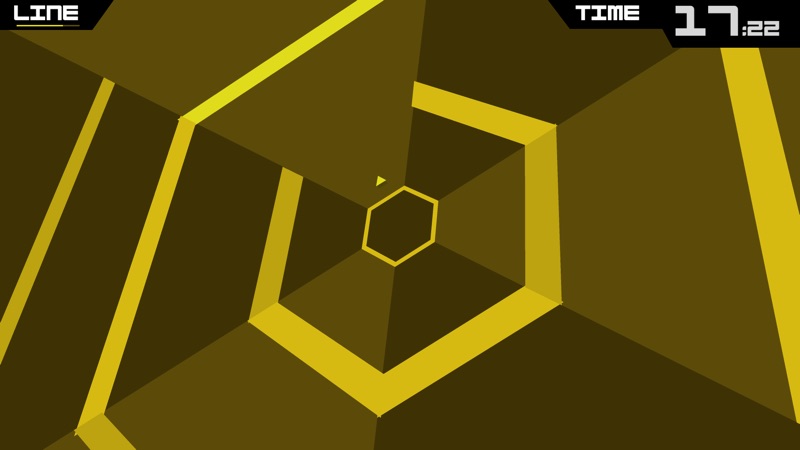 Super Hexagon gameplay screenshot — rotating geometric hexagon tunnel