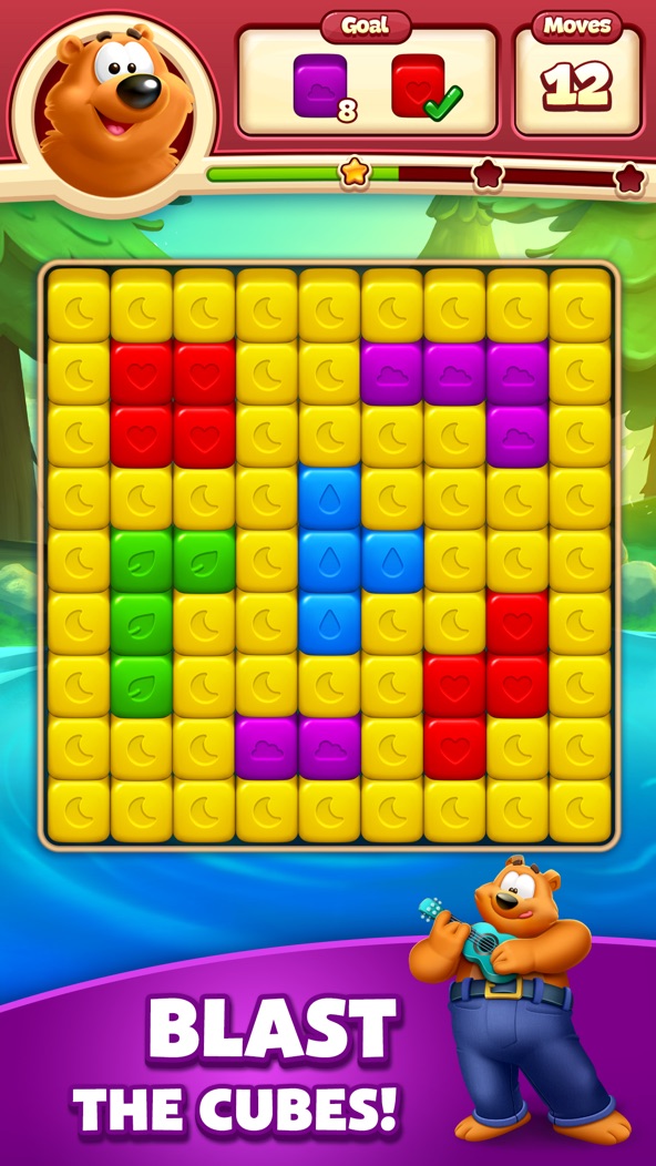 Toon Blast screenshot — tapping groups of coloured cubes to clear a cartoon level